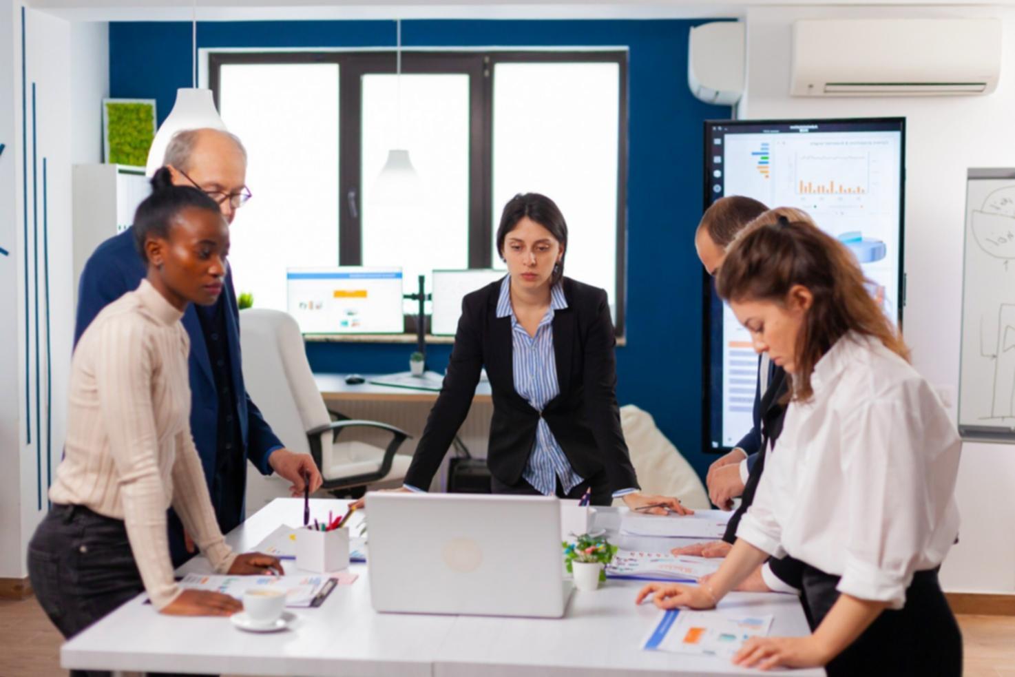 Detailed view of investment analysis materials and strategic planning documents