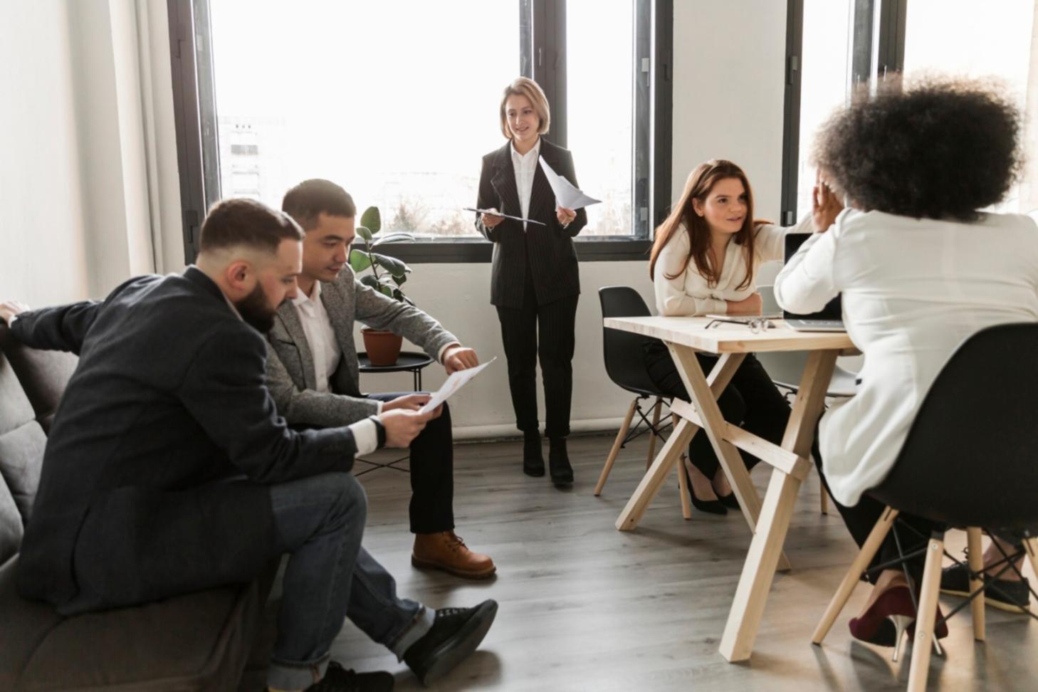 Professional learning environment with focused individual reviewing financial materials